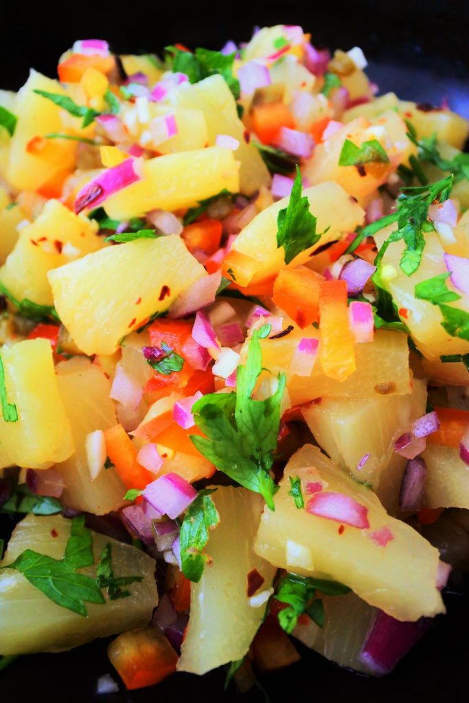 A close up image of fresh pineapple salsa