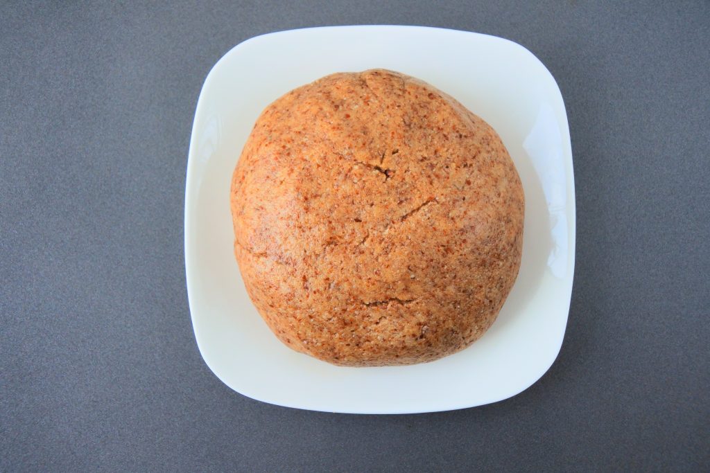An overhead image of a plate with the dough for homemade gingerbread cookies