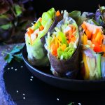 A head-on image of sliced summer rolls