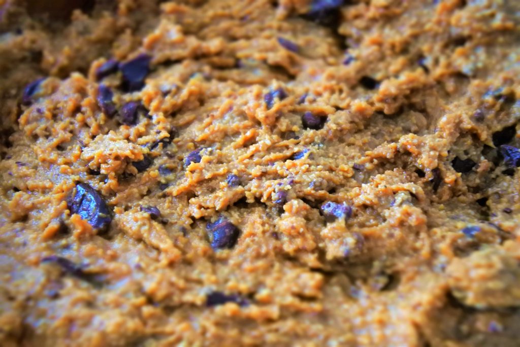 A close up image of gluten free chocolate chip cookie dough