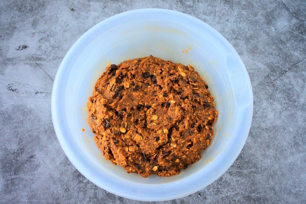 An overhead image of a bowl of chilled oatmeal chocolate chip cookie dough