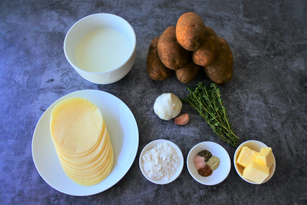 An overhead image of ingredients for a potato au gratin