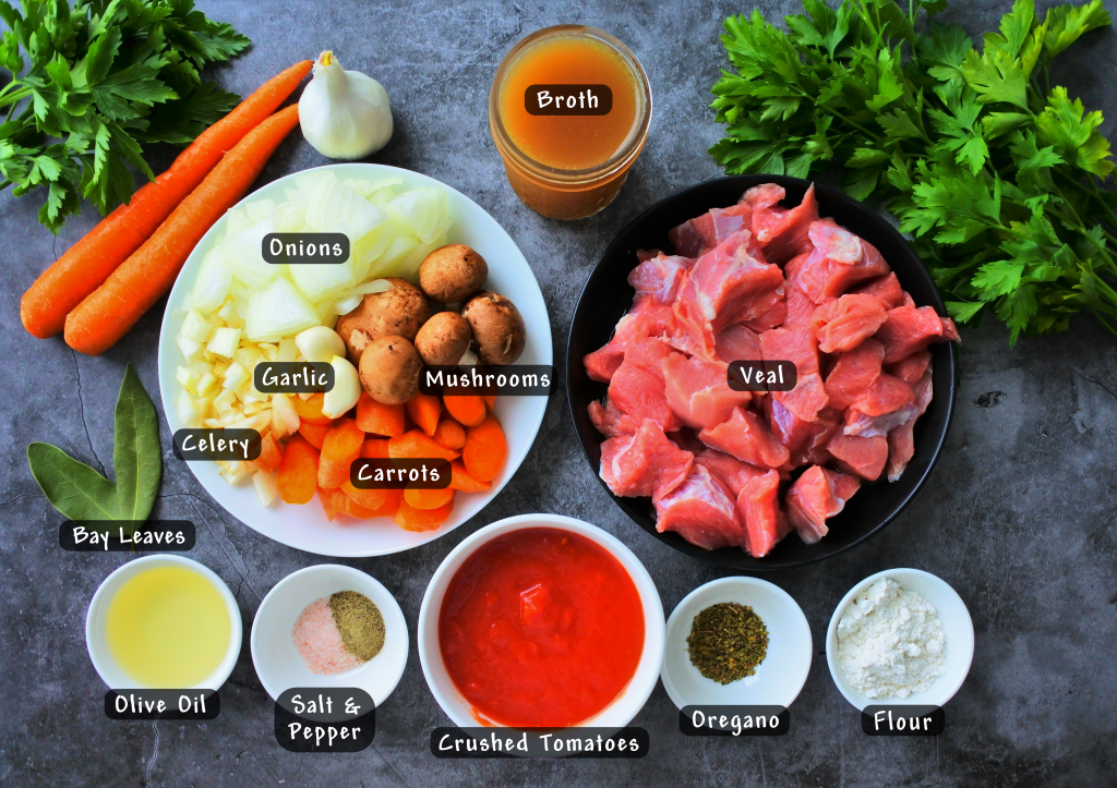 An overhead image of all ingredients needed to make an Italian veal stew - spezzatino di manzo