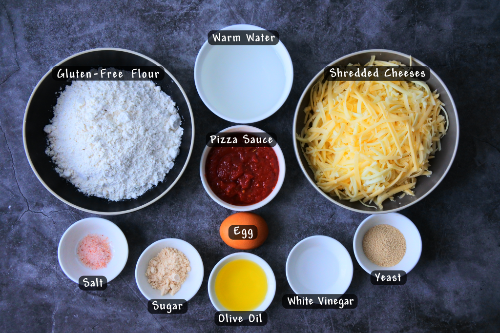 An overhead image of bowls of ingredients needed for making a gluten-free pizza