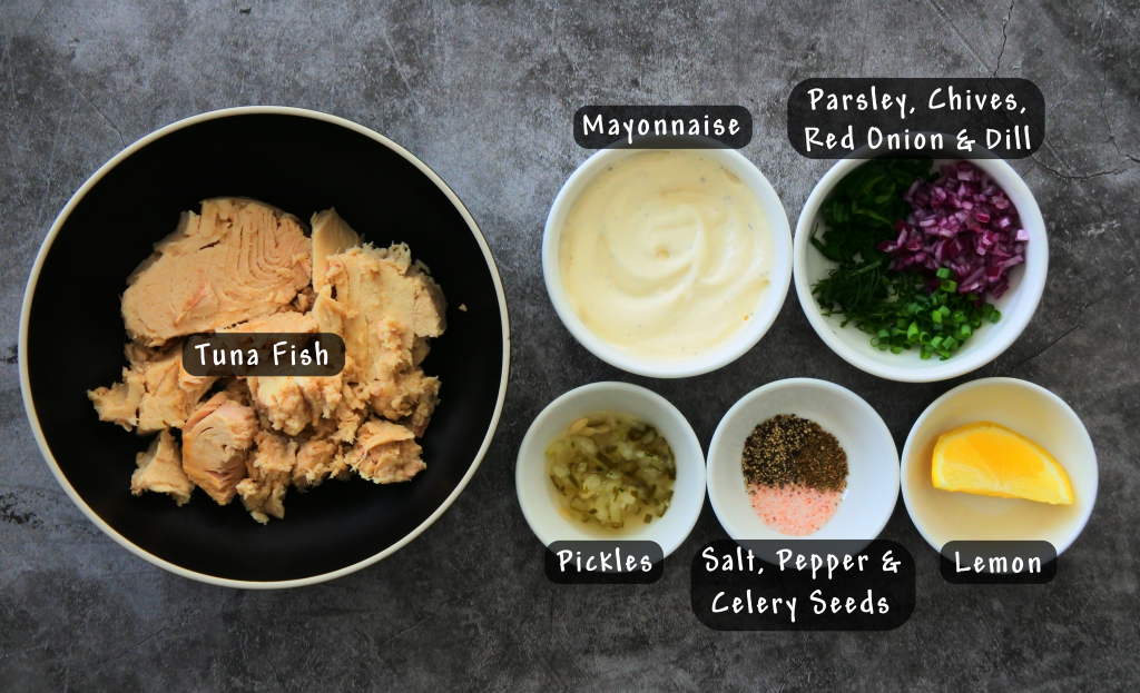 An overhead image of ingredients in bowls for a simple homemade tuna salad