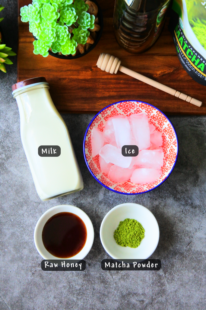 An overhead image of ingredients needed for an easy homemade matcha latte