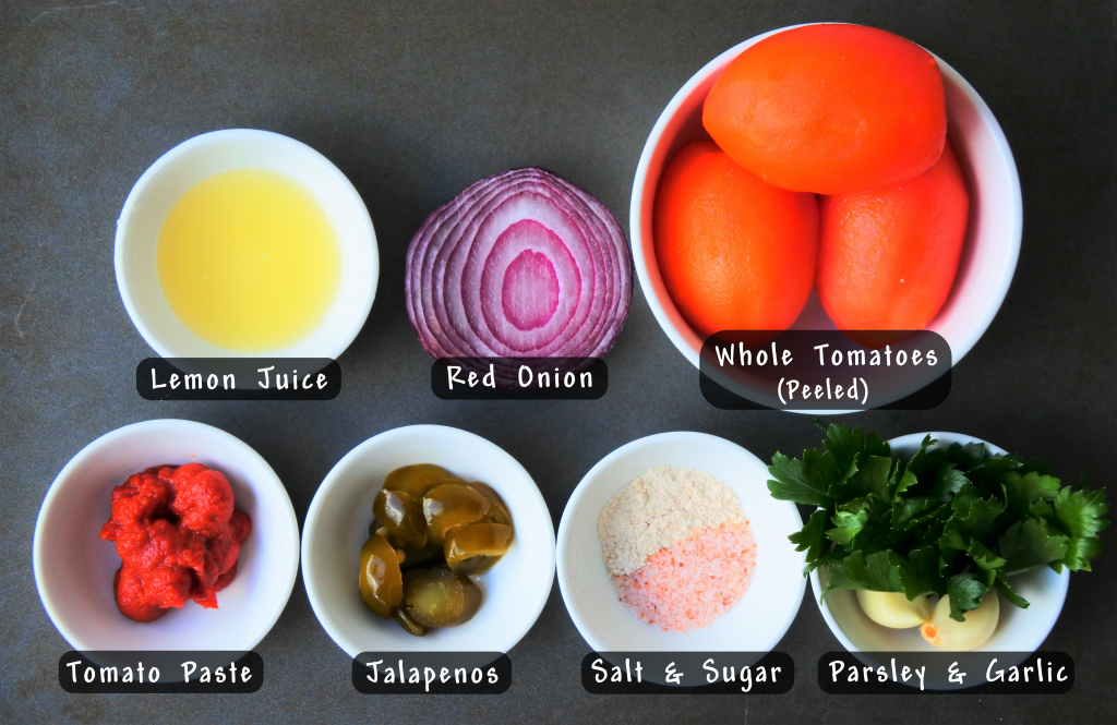 An overhead image of ingredients in bowls for a simple tomato salsa.