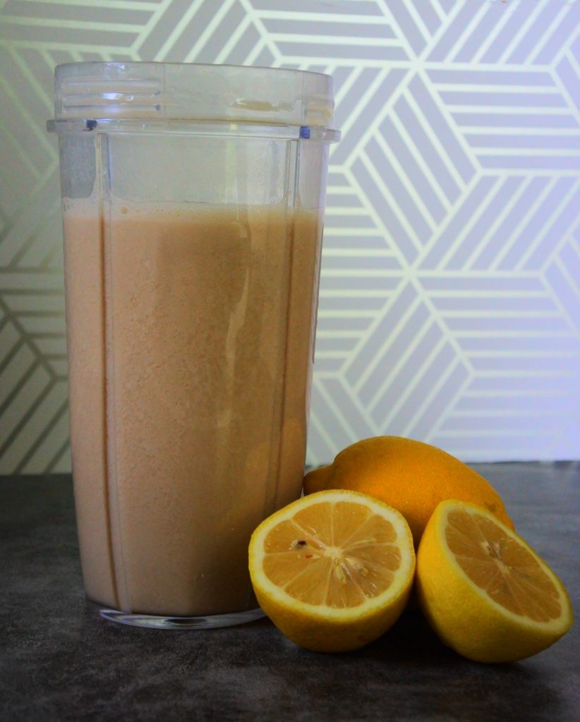 A close up image of a blended together creamy dreamy lemonade showing some mild separation after sitting for a bit