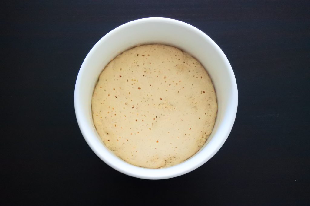 An overhead image of a bowl of activated/bloomed yeast