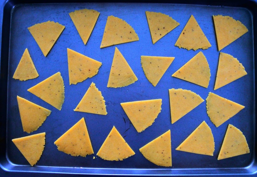 An overhead image of a tray of unbaked chickpea crackers