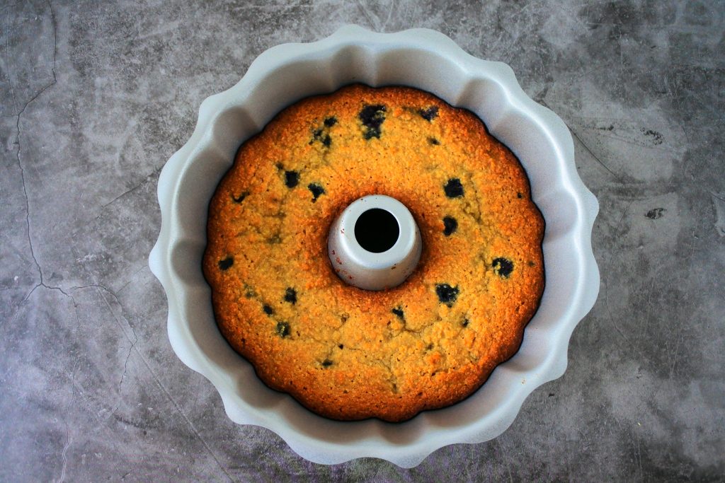 An overhead image of a freshly baked lemon blueberry bundt cake