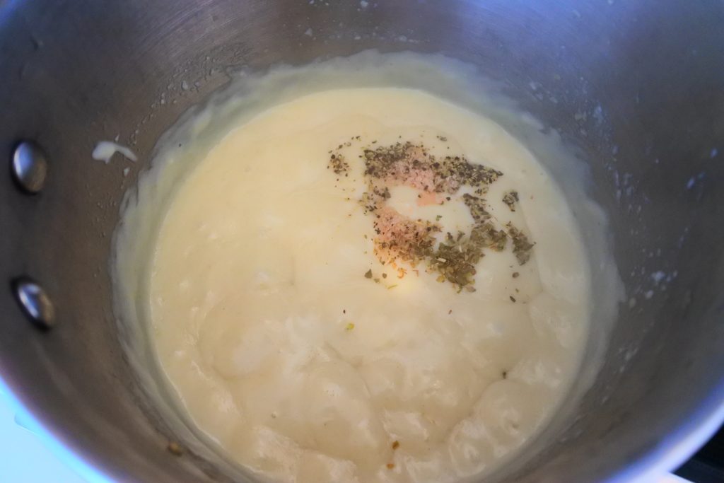 An overhead image of a roux with seasoning added to it