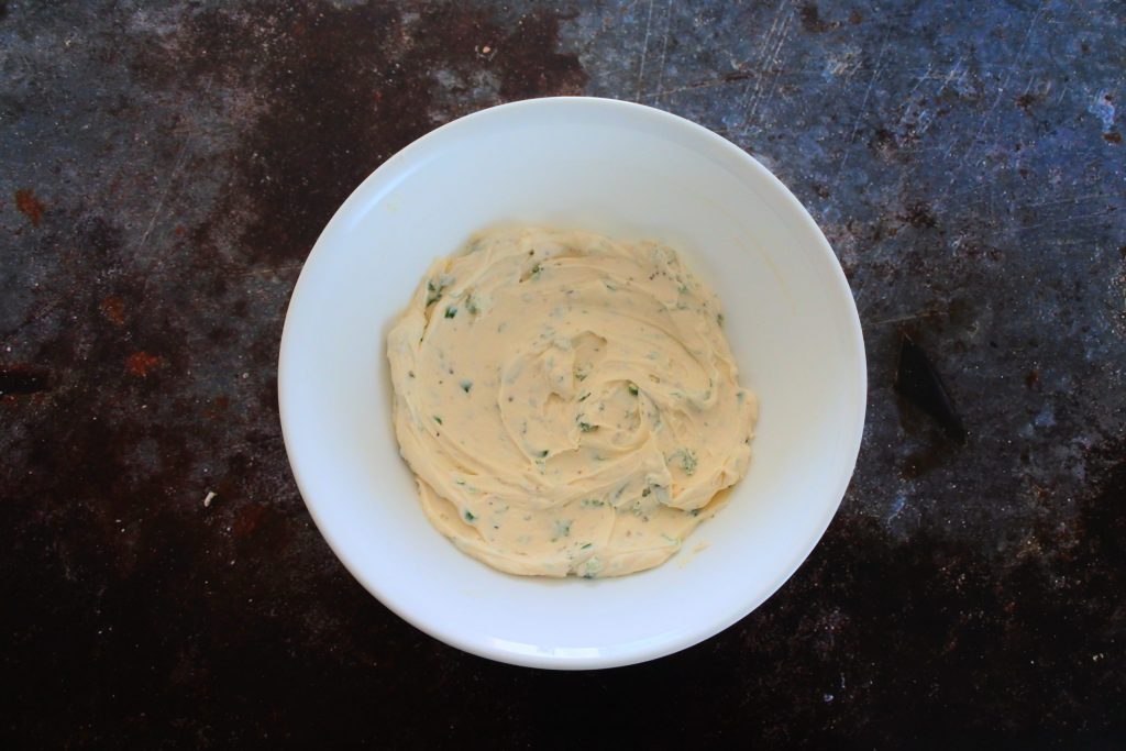 An overhead image of a bowl of creamy dip mixture
